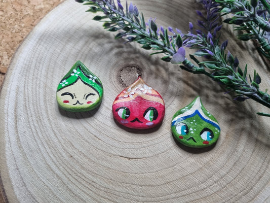 Spille scolpite e dipinte a mano